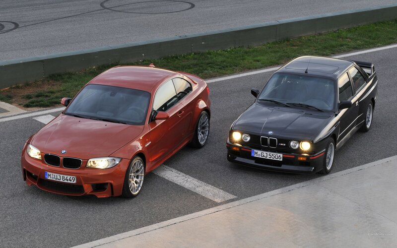 BMW M3 cars on racetrack