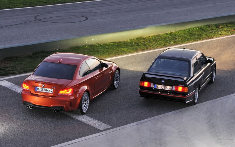 BMW M3 cars on racetrack