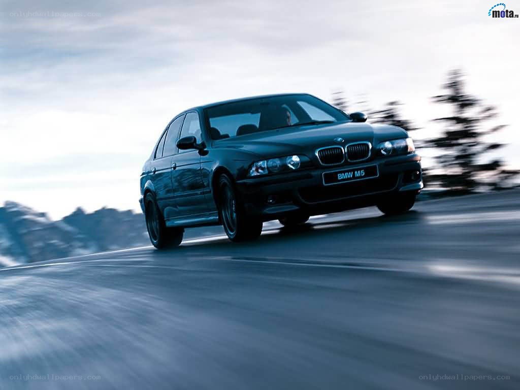 BMW M5 on a mountain road
