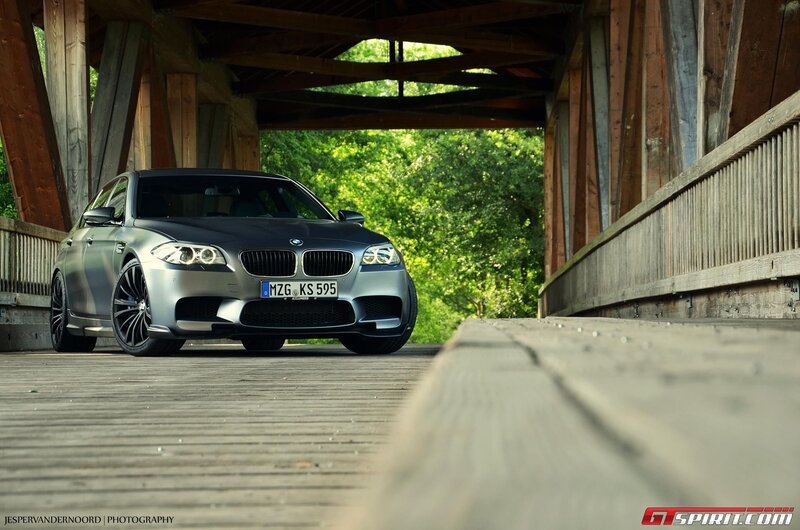 BMW M5 on a wooden bridge