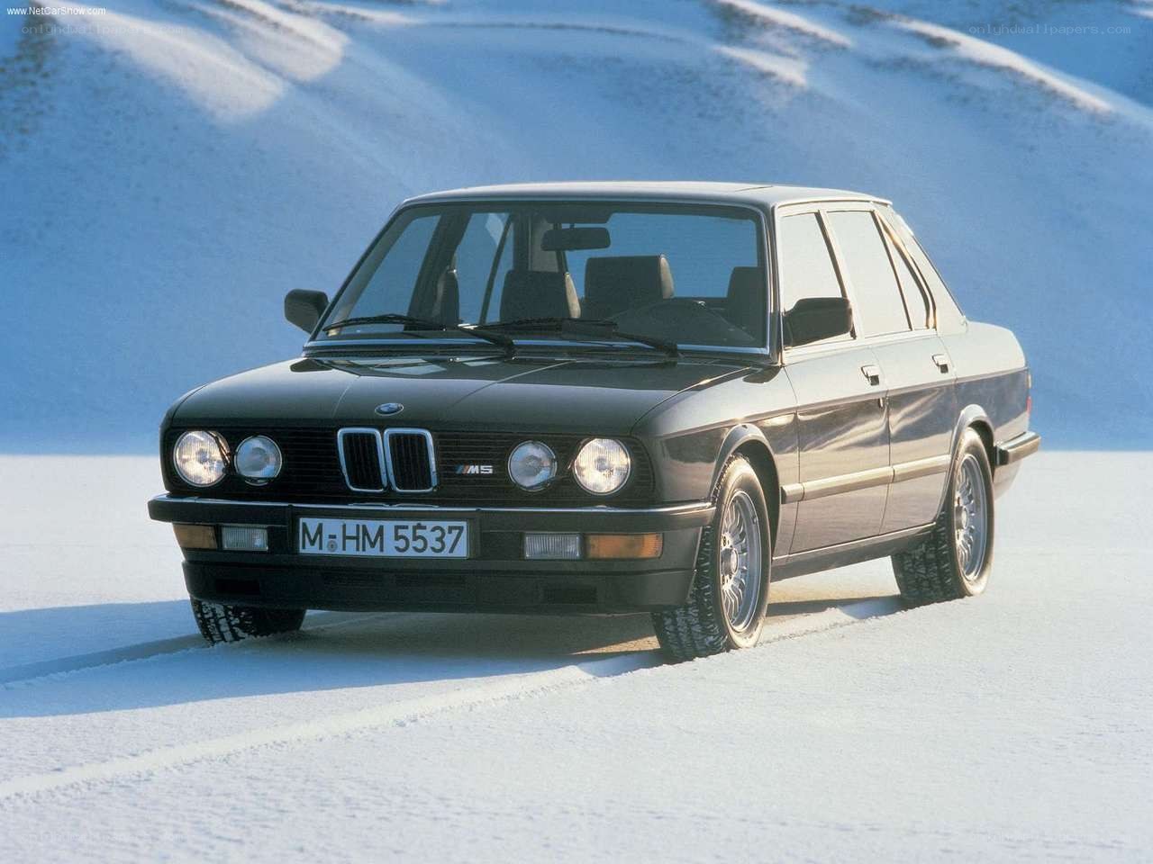 BMW M5 on snowy road