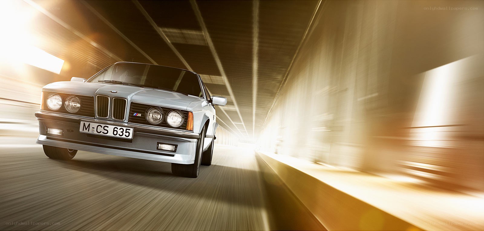 BMW M6 driving through tunnel