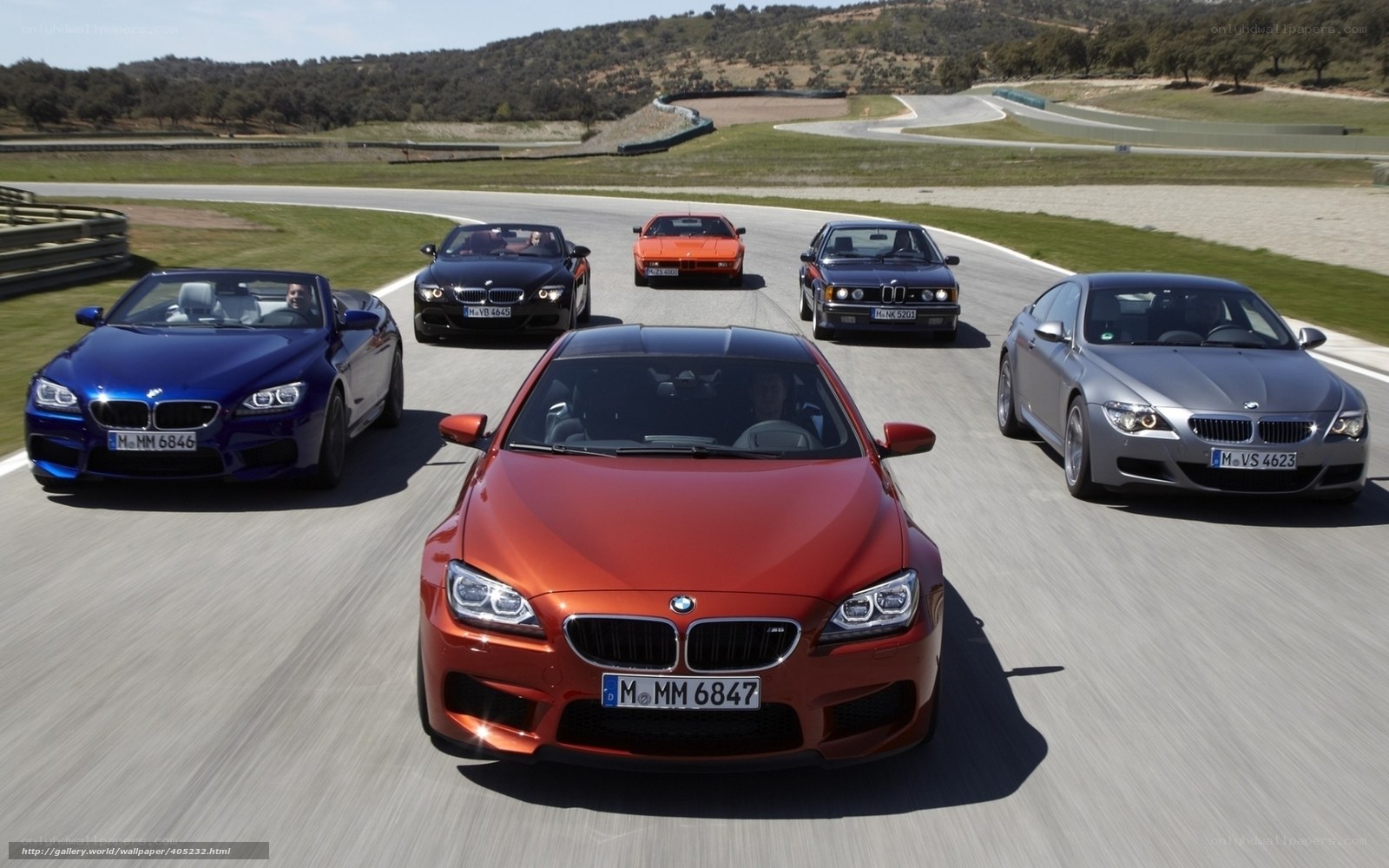 BMW M6 models on a racetrack