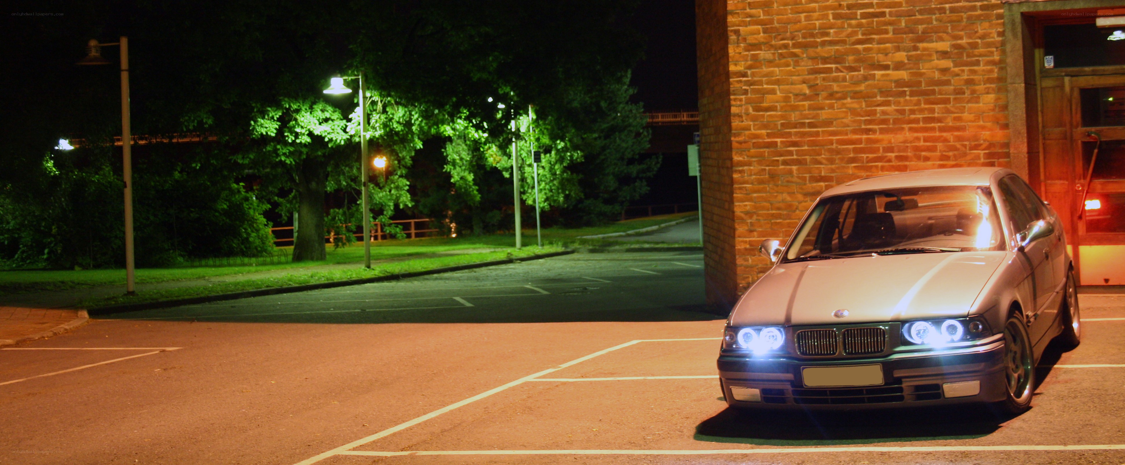 BMW parked at night
