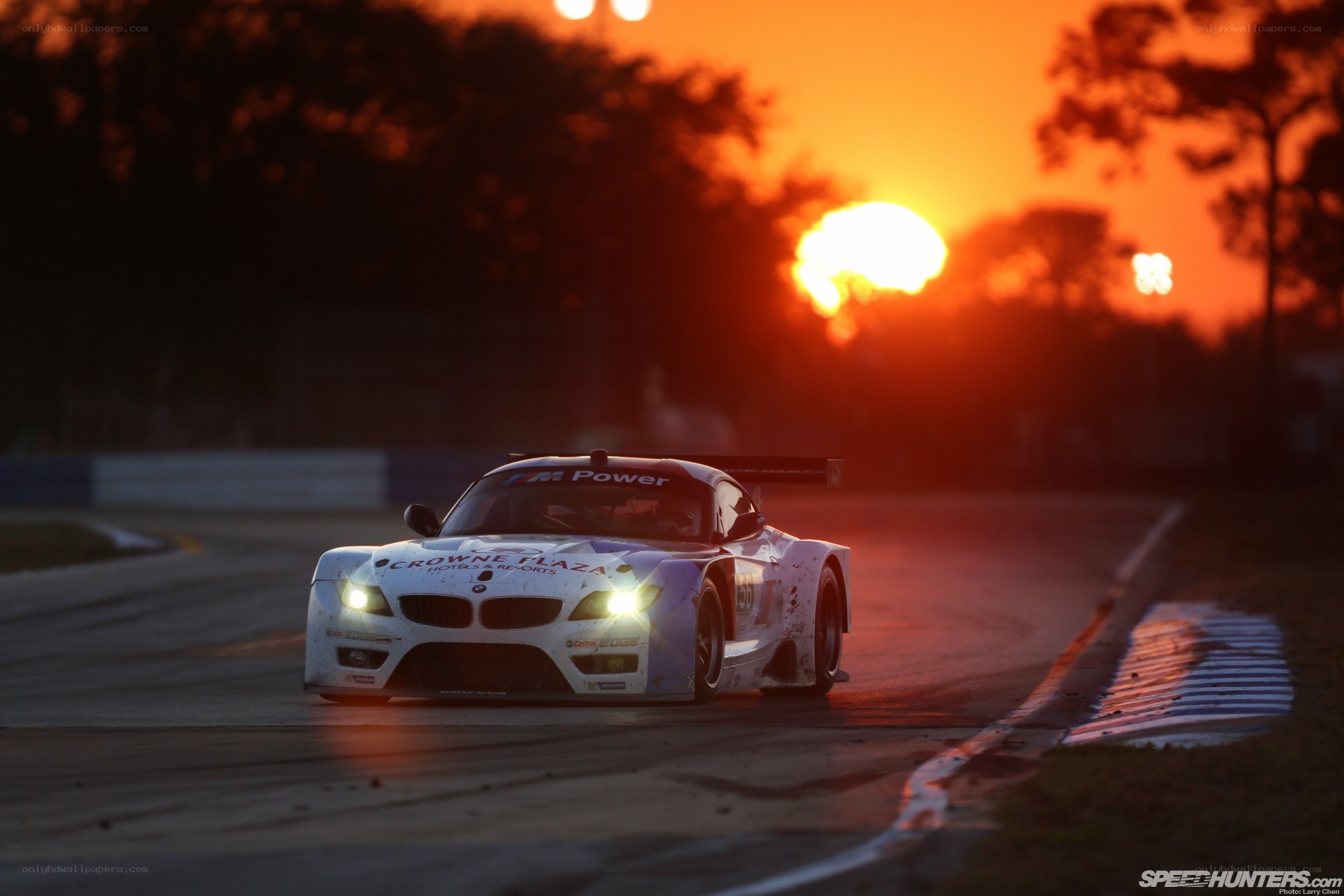 BMW race car at sunset