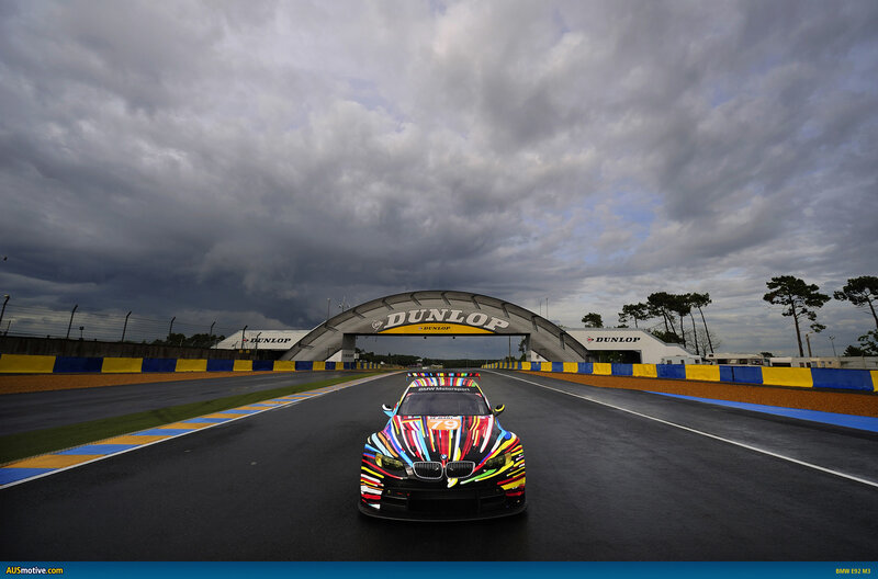 BMW Race Car on Track — Black, Dramatic, Afternoon