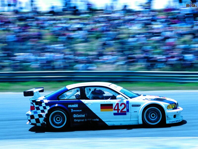 BMW Race Car on Track — White, Dynamic, Afternoon, Photograph, Crowd