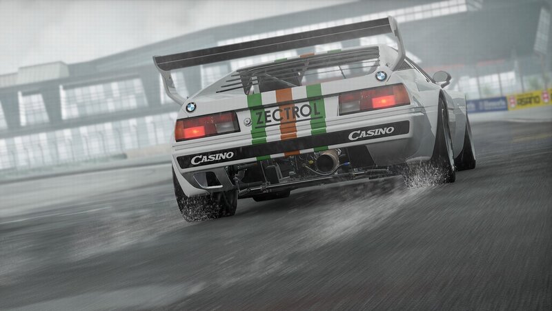 BMW race car on wet track
