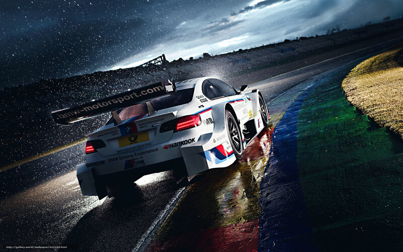 BMW race car on wet track