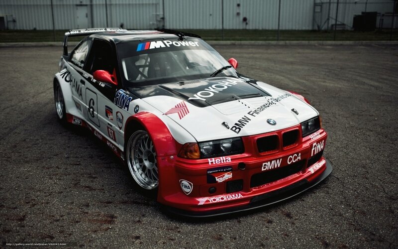 BMW race car with sponsor decals