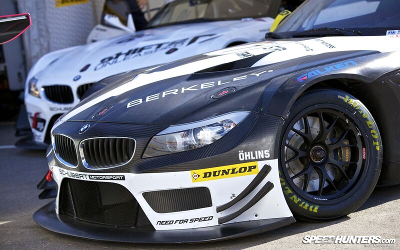 BMW race cars in pit lane