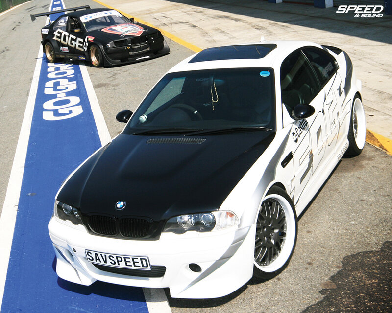 BMW race cars on track