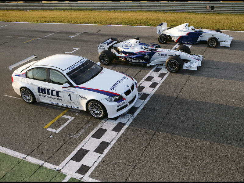BMW race cars on track