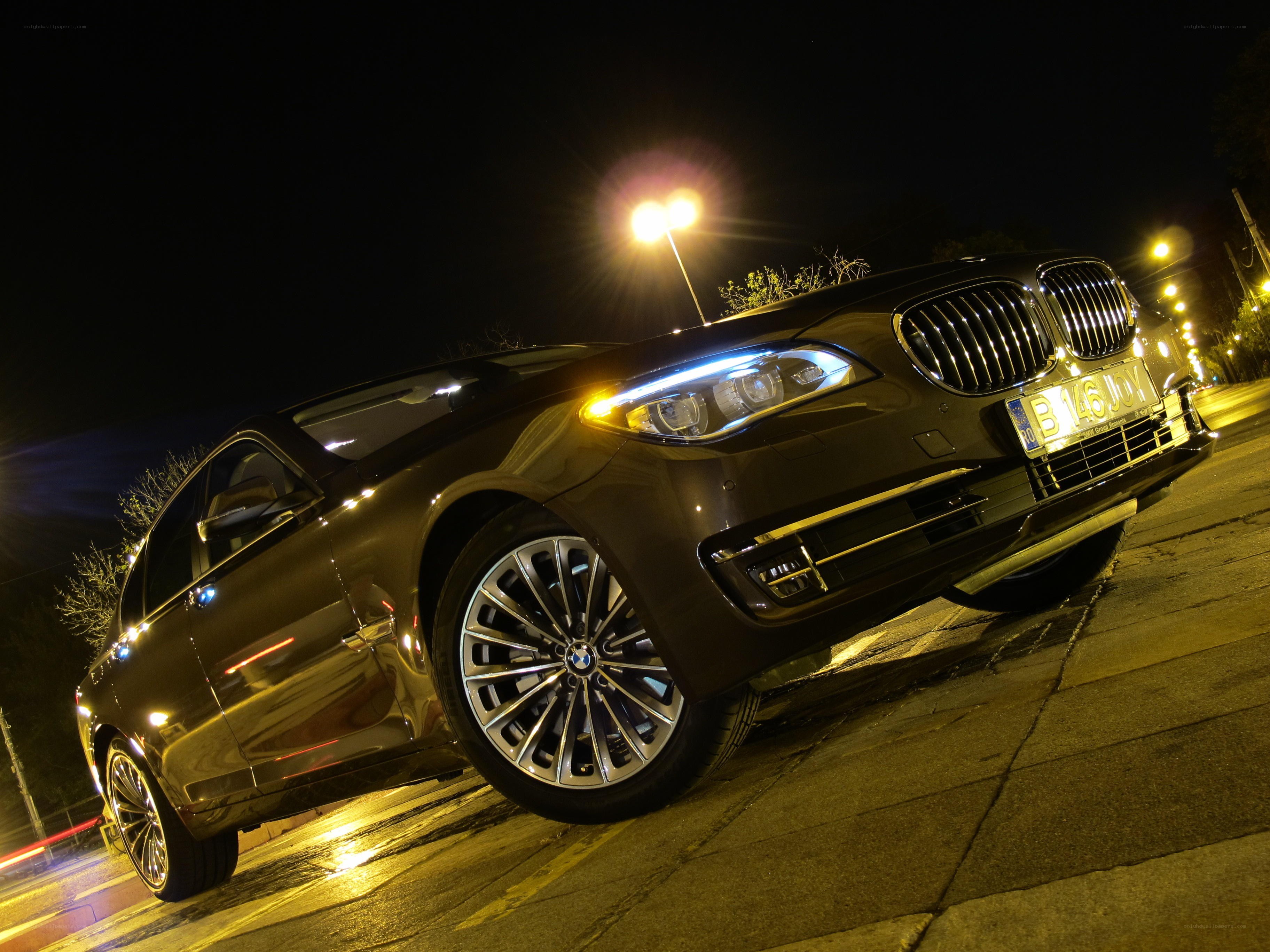 BMW sedan at night