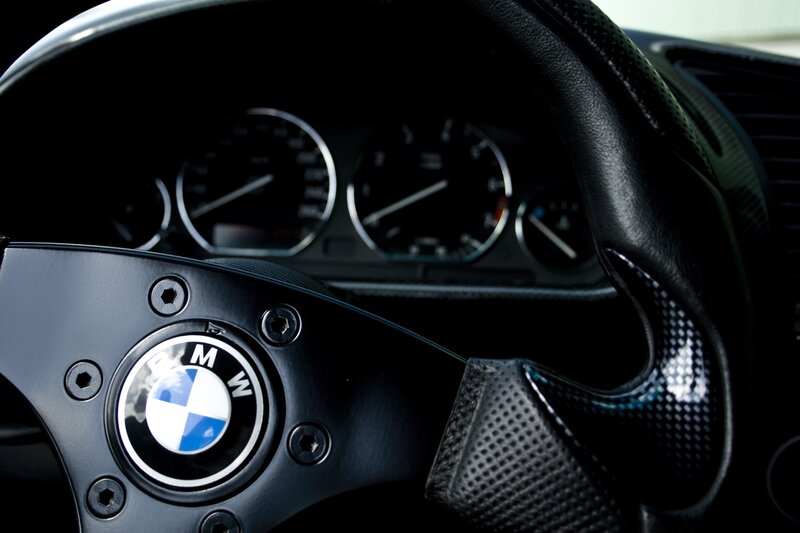 BMW Steering Wheel — Black, Dramatic, Photograph