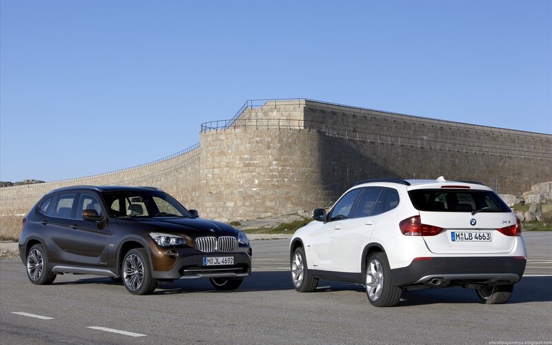 BMW X1 cars on a road