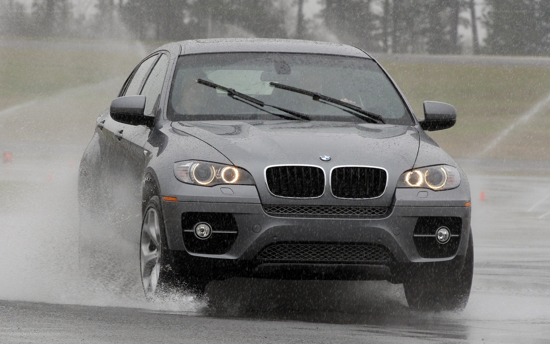 BMW X6 driving in rain