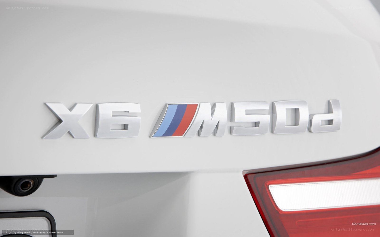 BMW X6 M50d badge