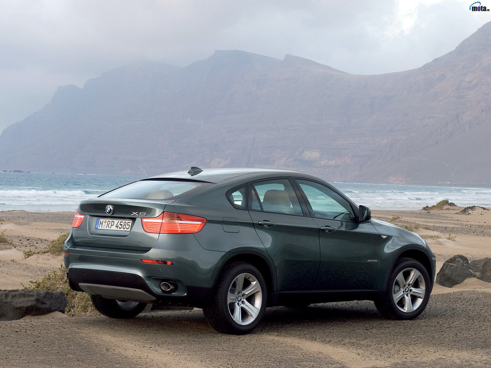 BMW X6 on a beach