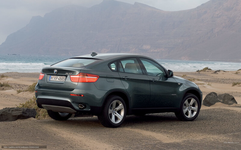 BMW X6 on a beach
