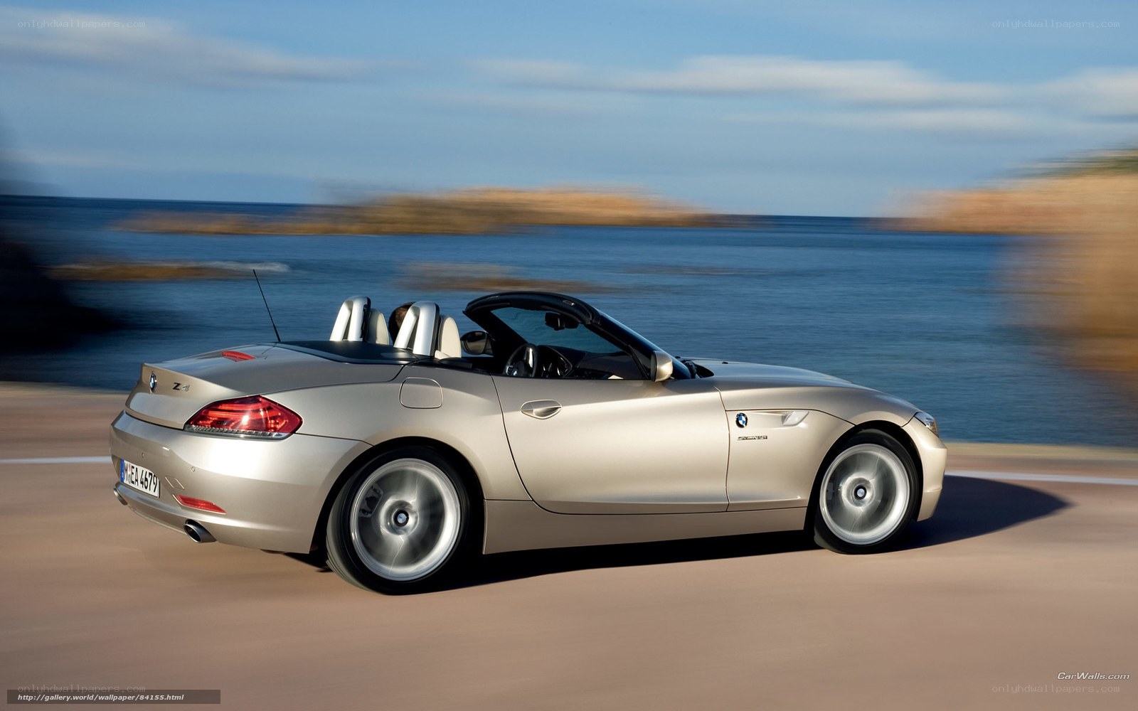 BMW Z4 convertible driving by sea