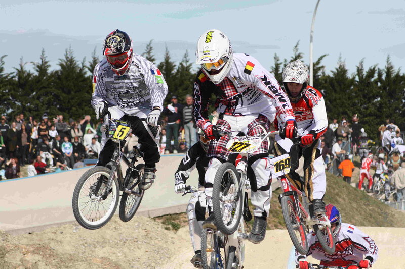 BMX racers in mid-air