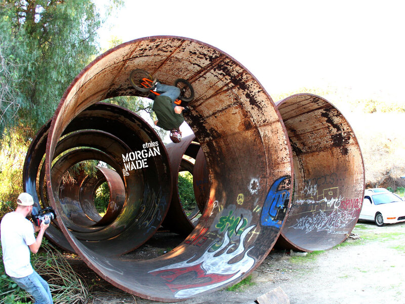 BMX rider in a metal tube