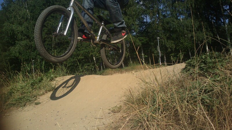 BMX rider on dirt jump