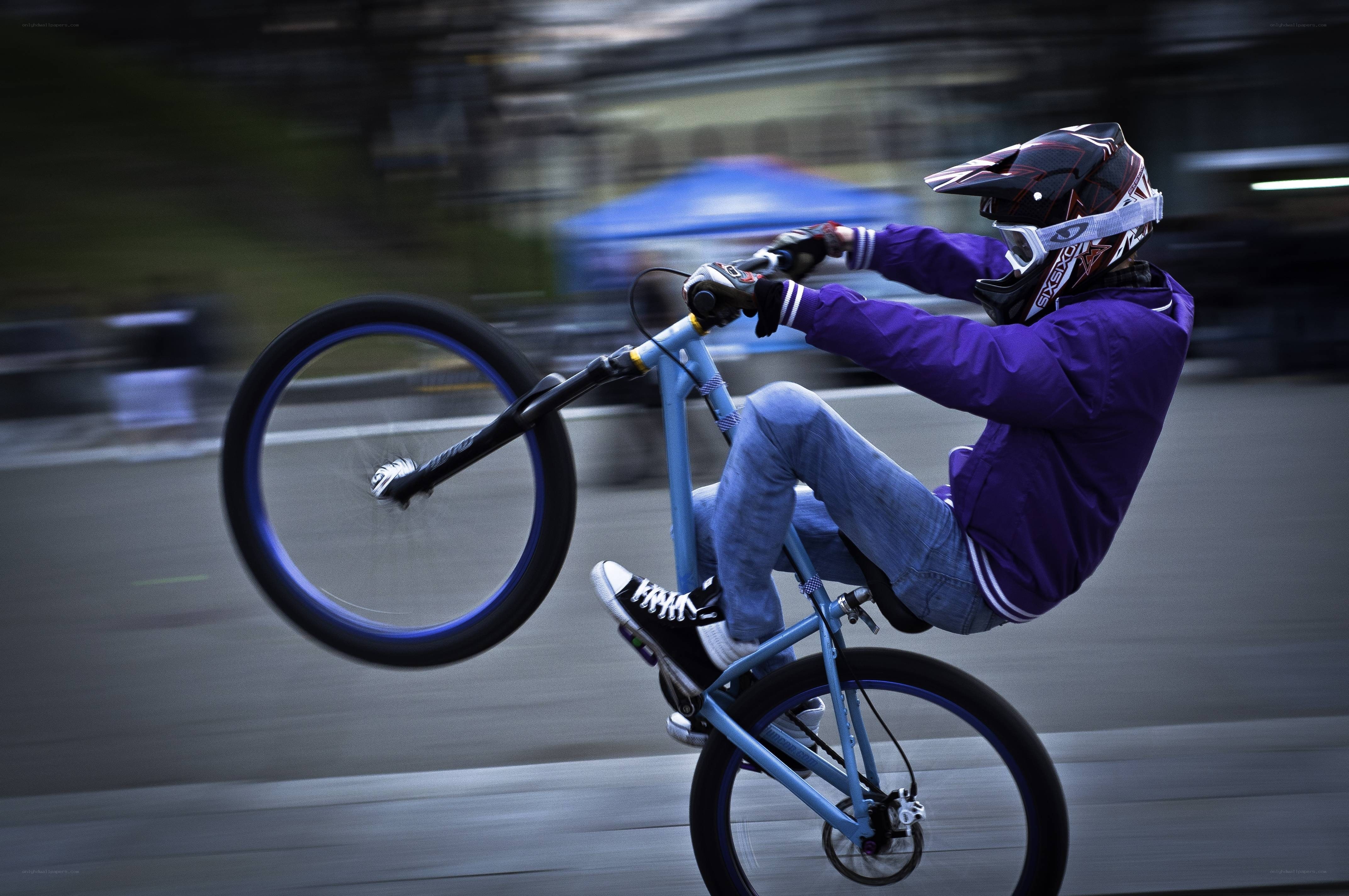 BMX rider performing wheelie