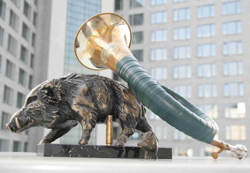 Boar and trumpet sculpture