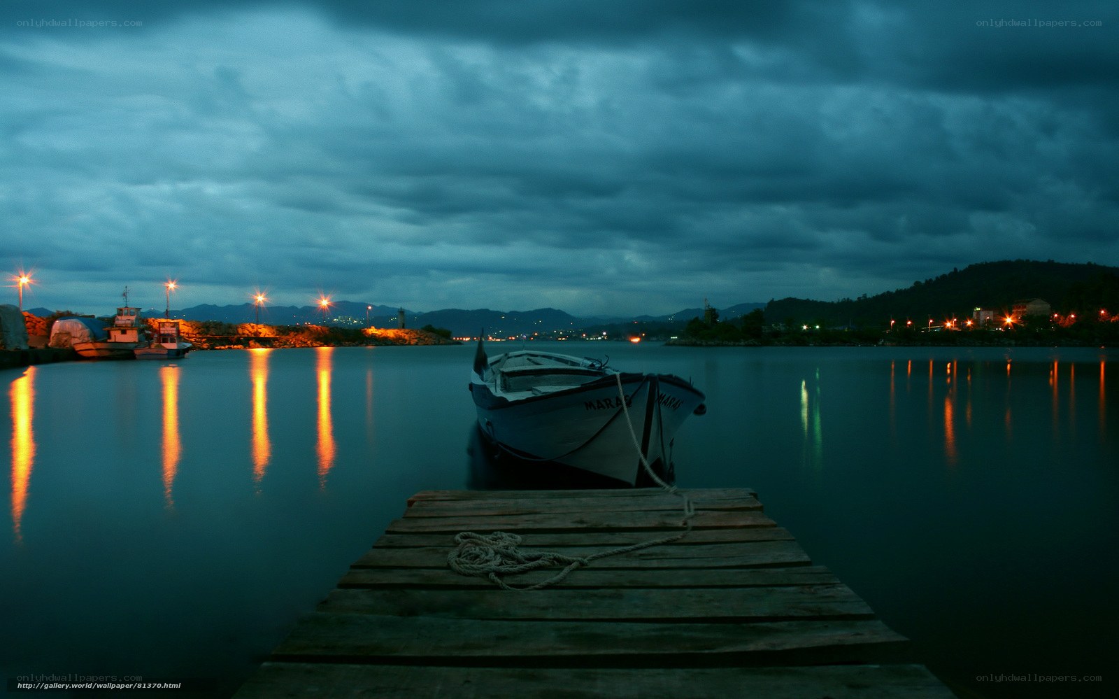 Boat at a dock at dusk