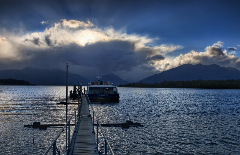 Boat at a dock on a lake