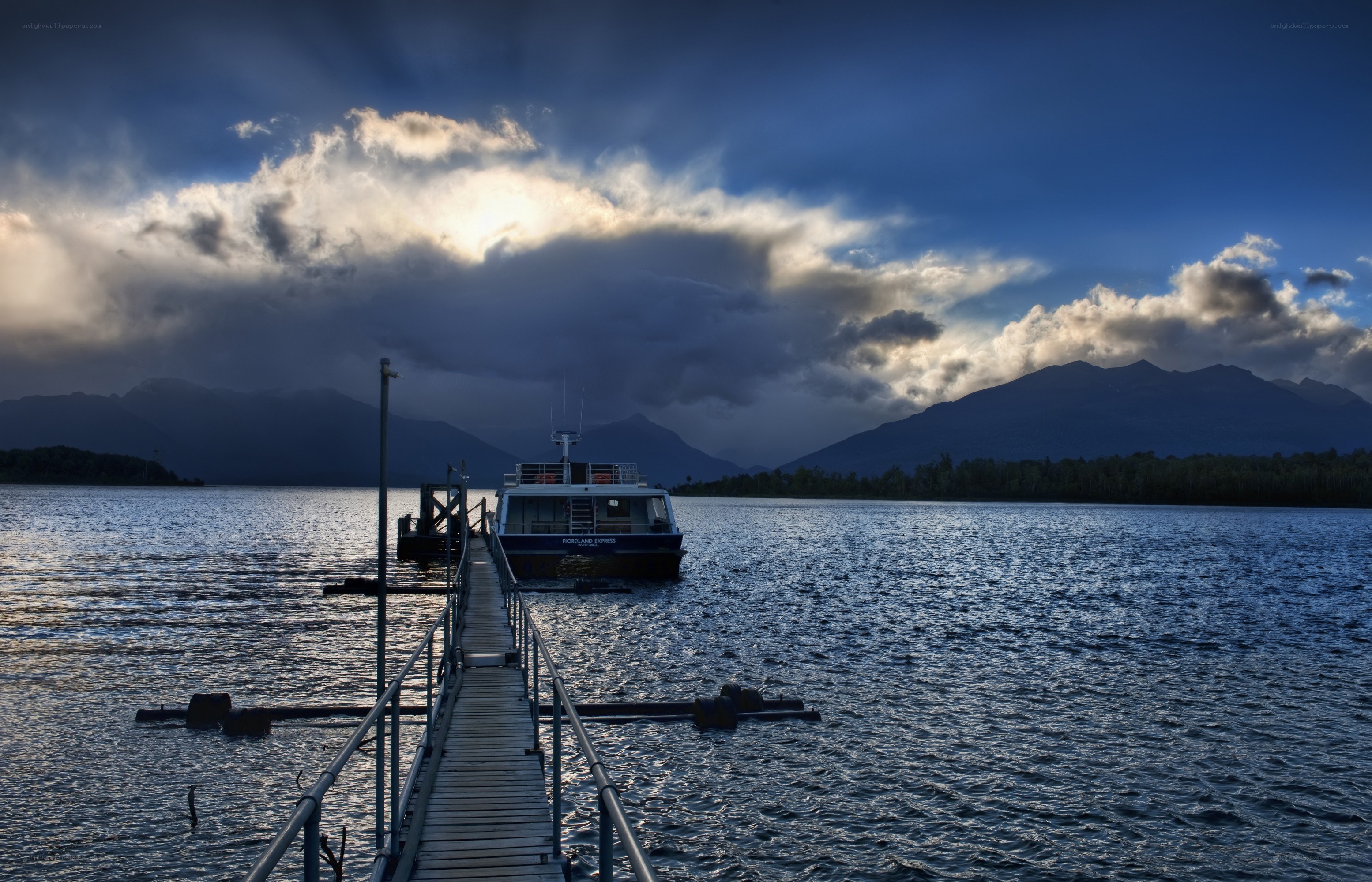 Boat at a dock on a lake
