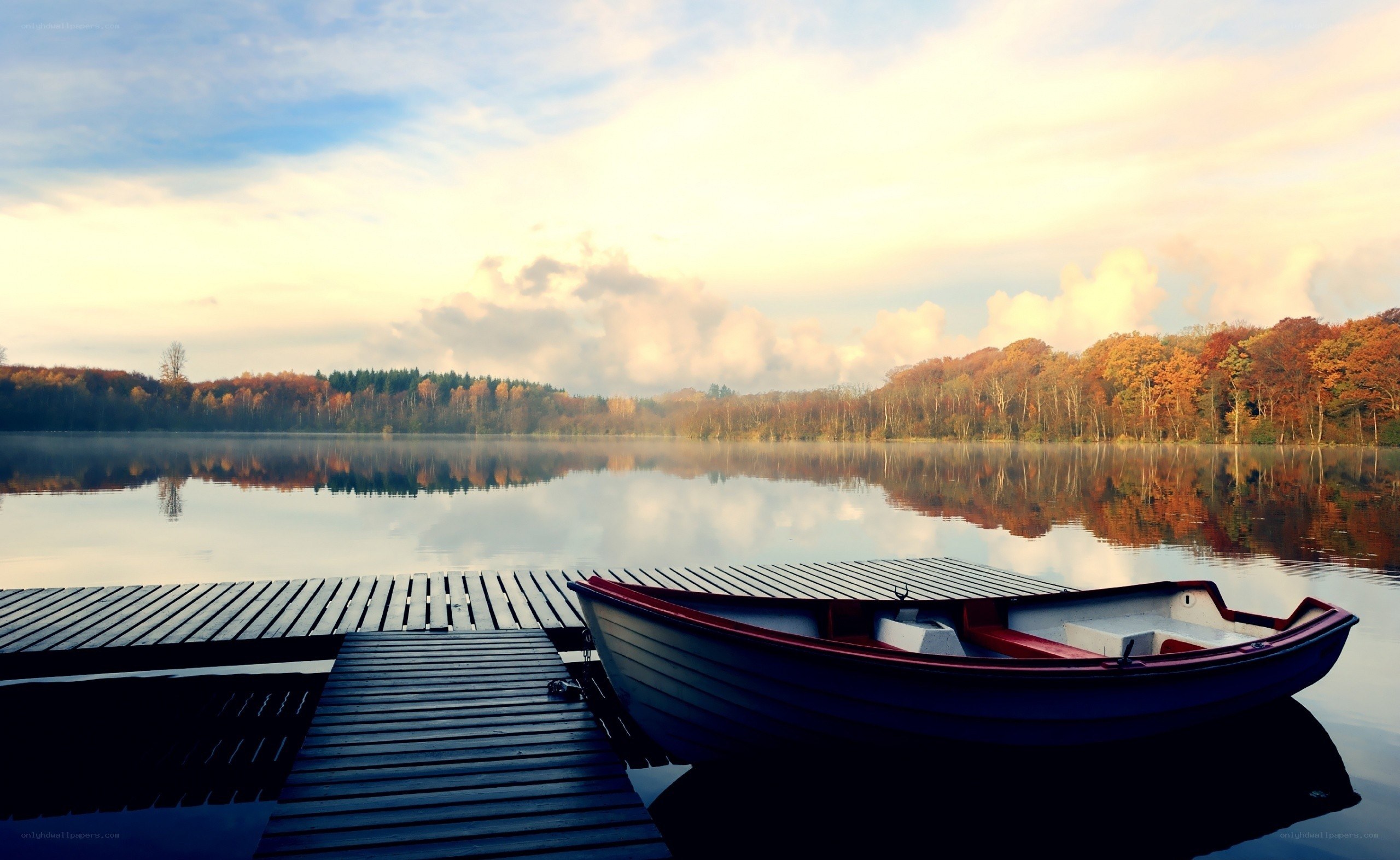 Boat at a serene lake dock