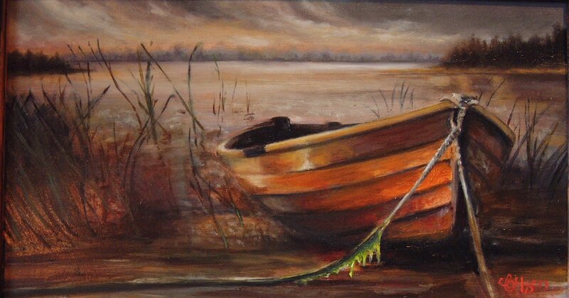 Boat at dusk on a lake
