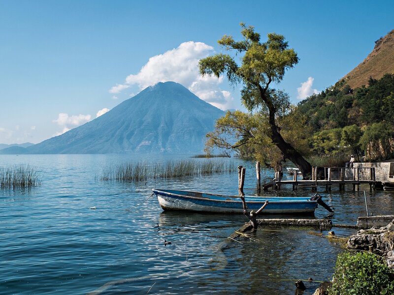 Boat at lake with volcano
