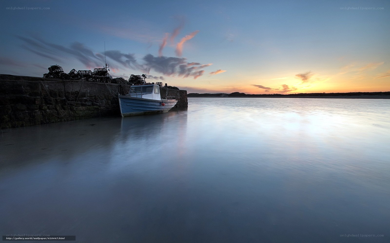 Boat at sunset by the harbor