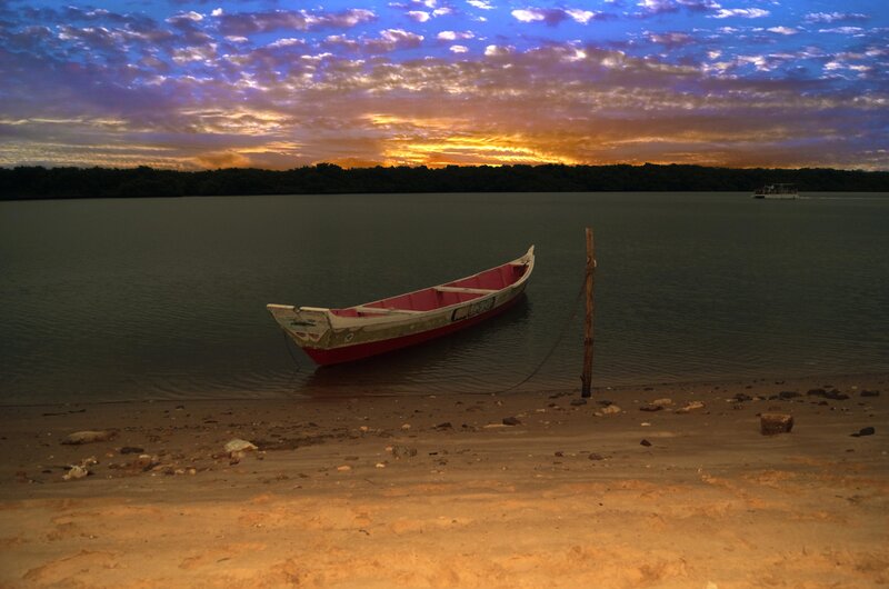 Boat at sunset on a calm lake