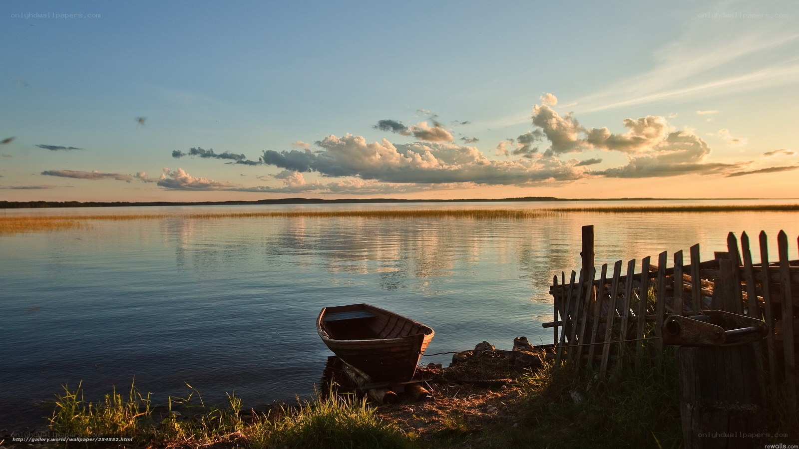 Boat at sunset on a calm lake