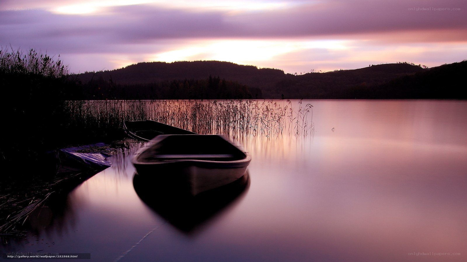 Boat at sunset on a lake