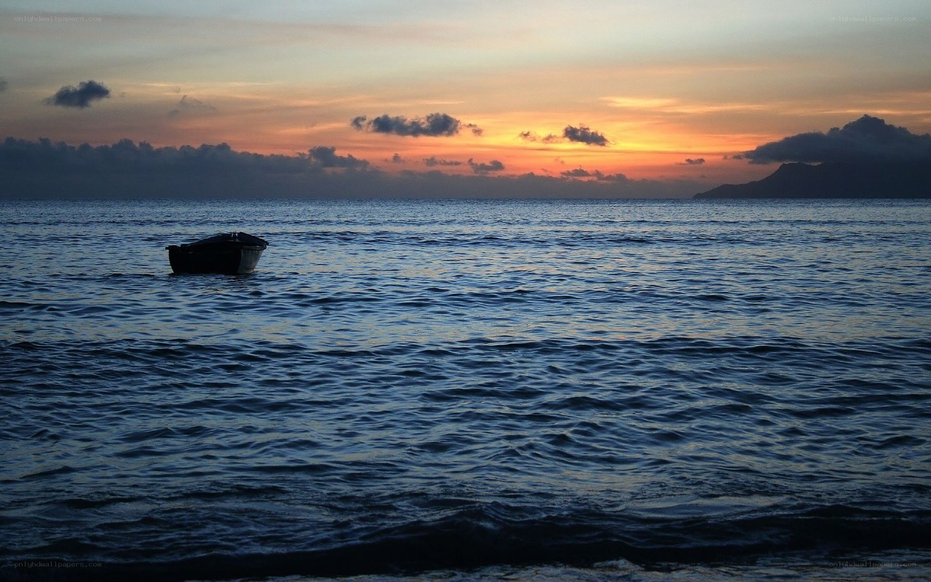 Boat at sunset on the ocean