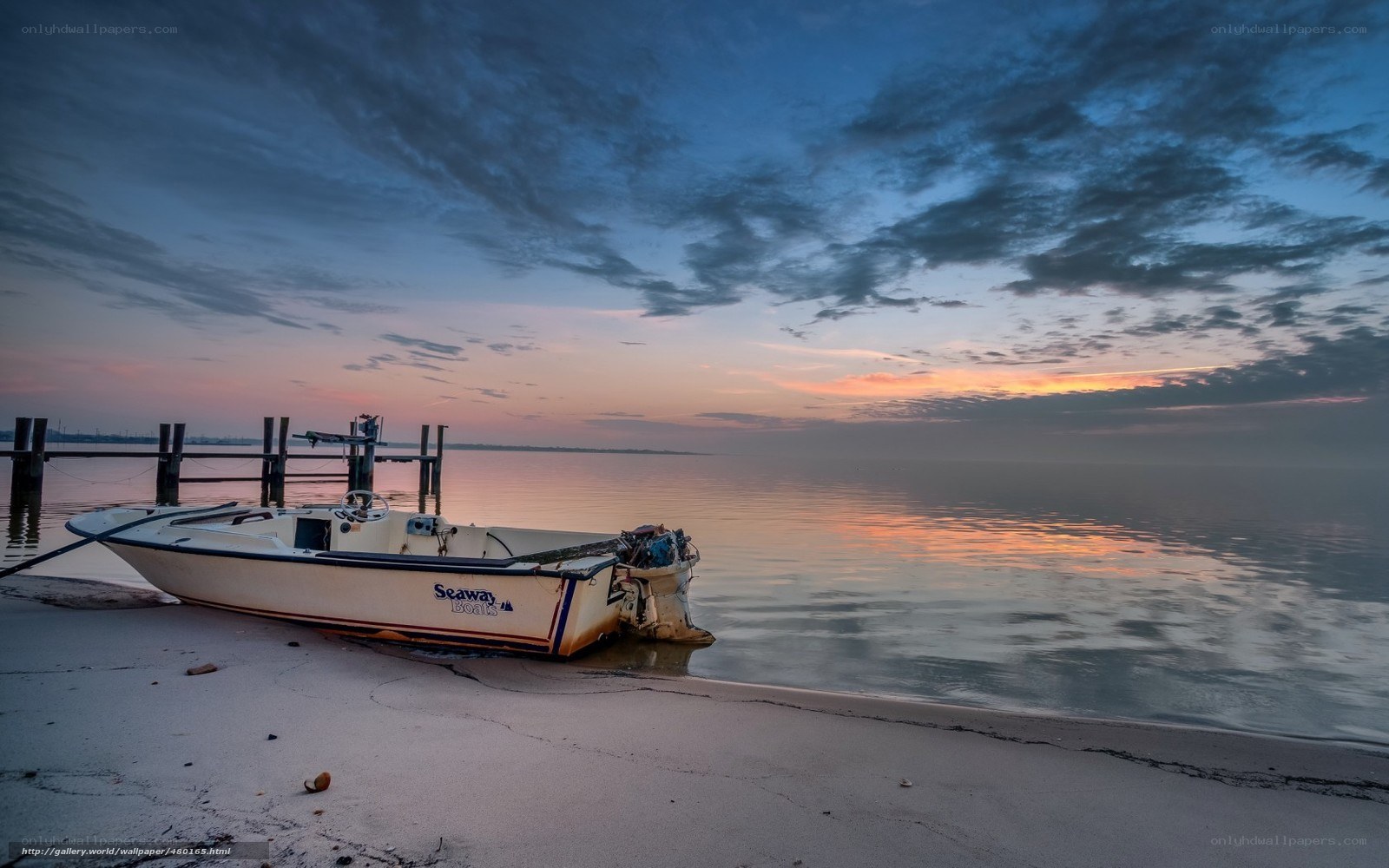 Boat at sunset on the shore