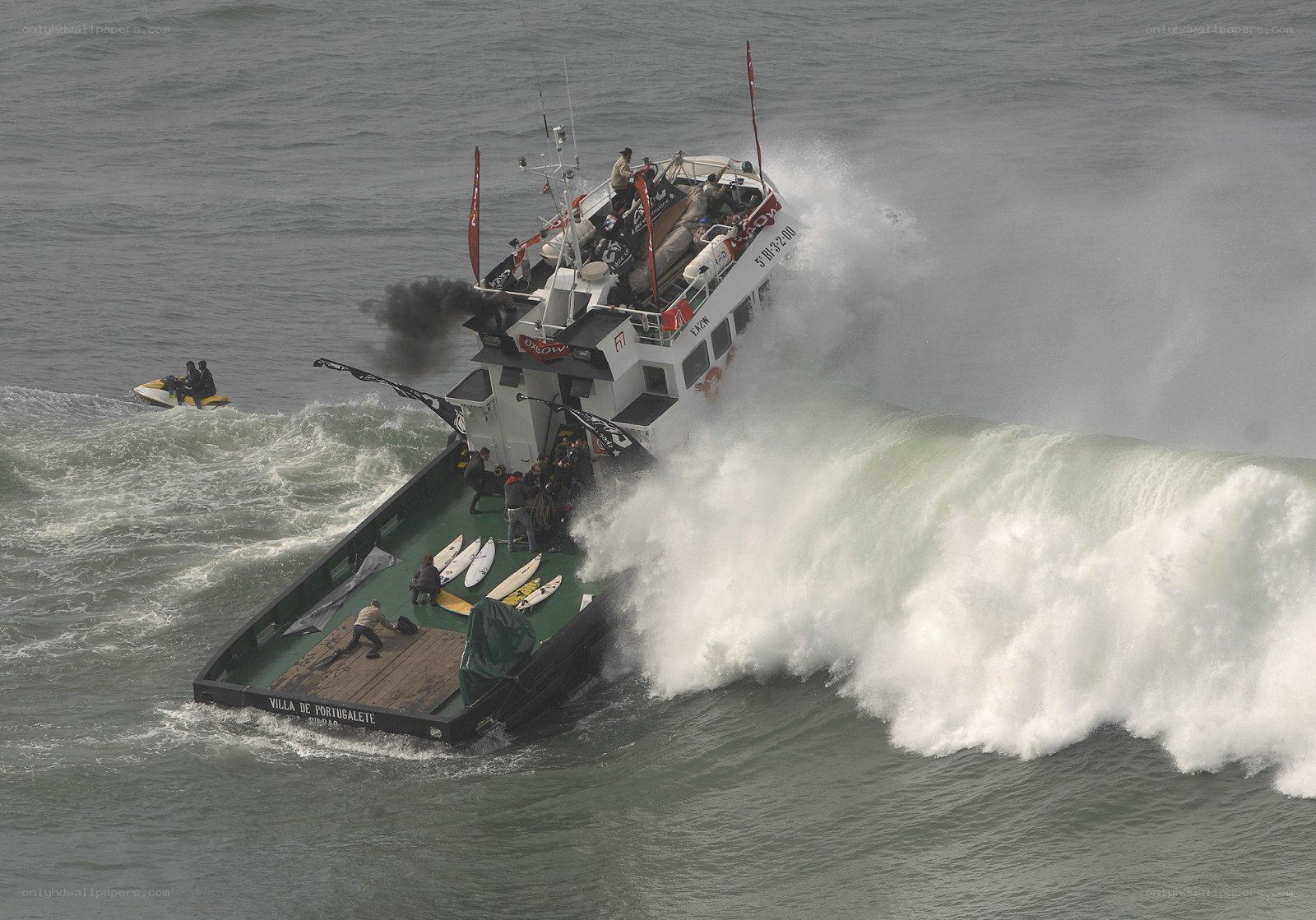 Boat hit by large wave