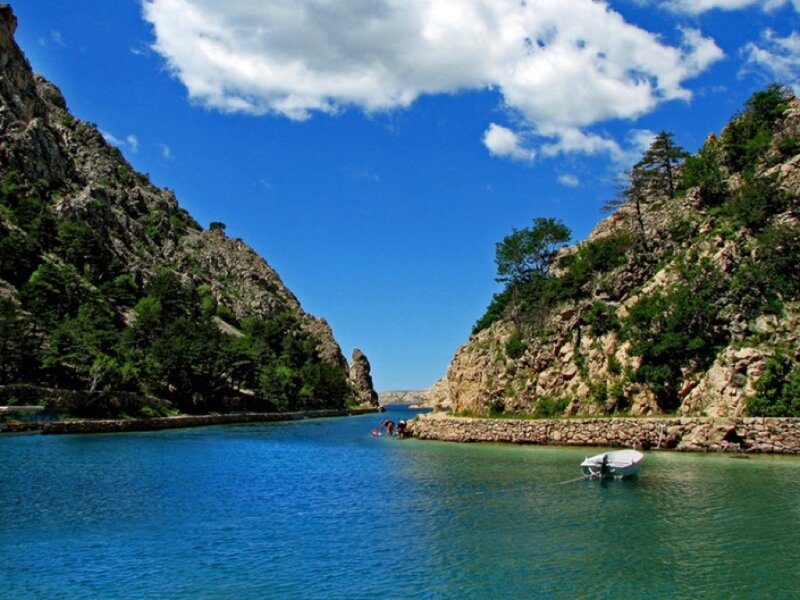 Boat in a Narrow Inlet