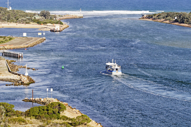 Boat in a River Mouth