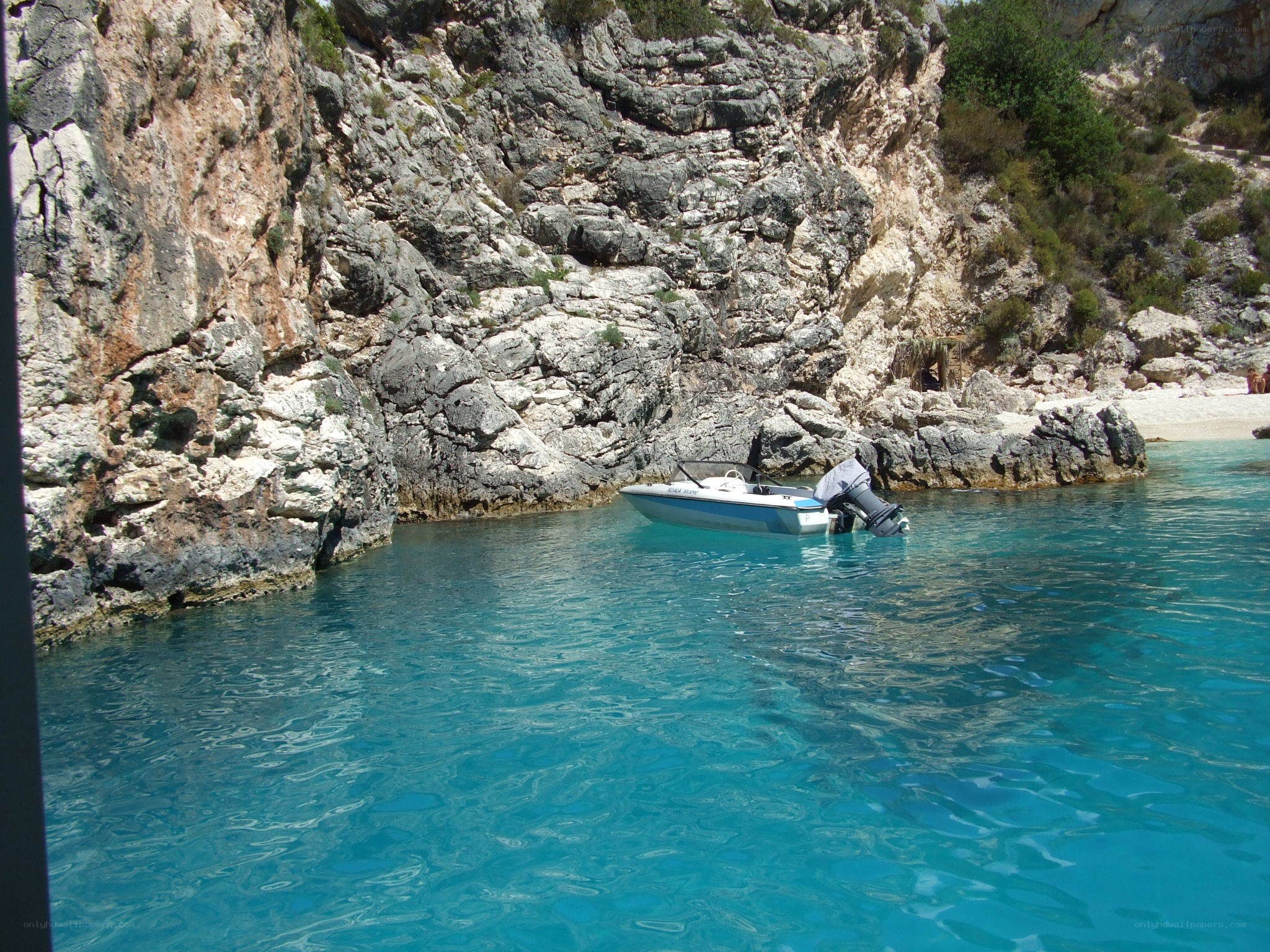 Boat in a rocky cove