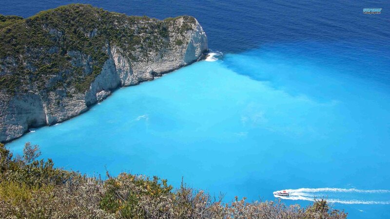 Boat in Blue Bay