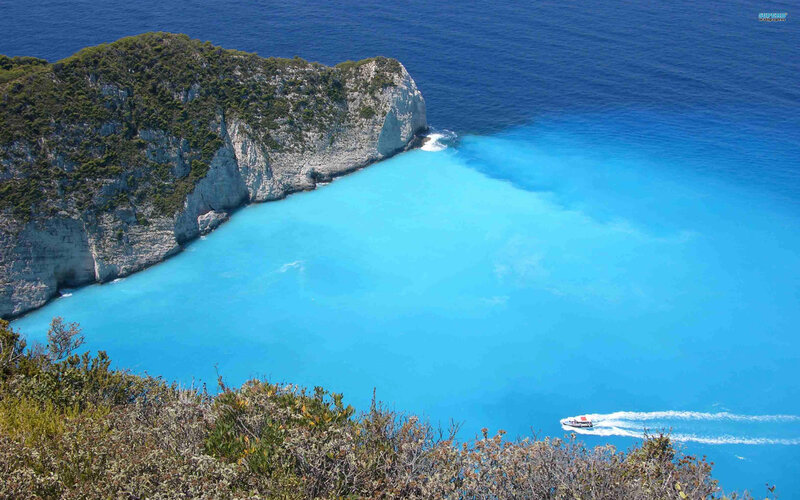 Boat in Blue Cove