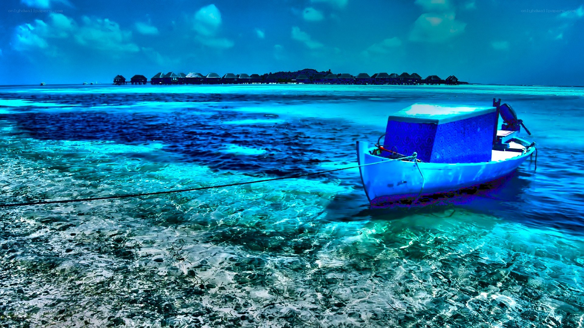 Boat in clear blue water