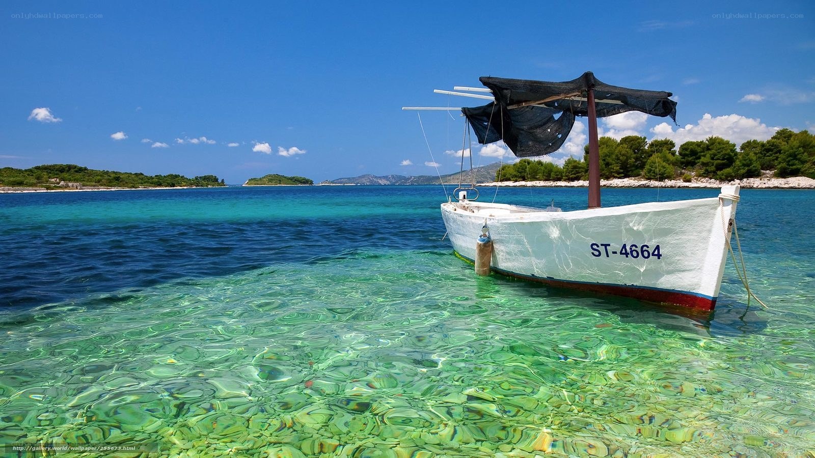 Boat in clear turquoise water